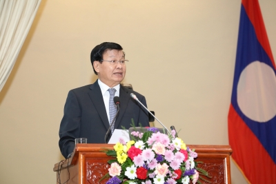 Lao President urges people to overcome challenges
